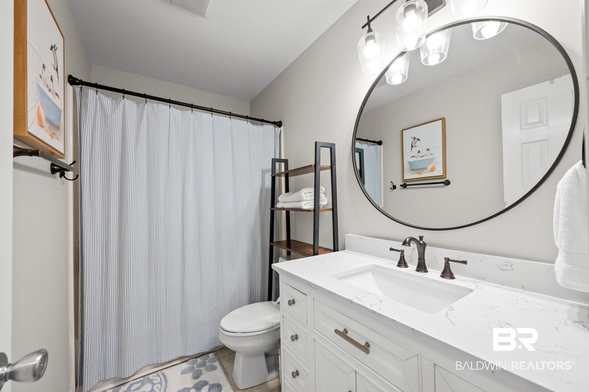 1825 Spring Hill Avenue Mobile, AL 36607 - Photo 29 of 43 Bathroom with a shower with curtain, vanity, and light tile patterned floors