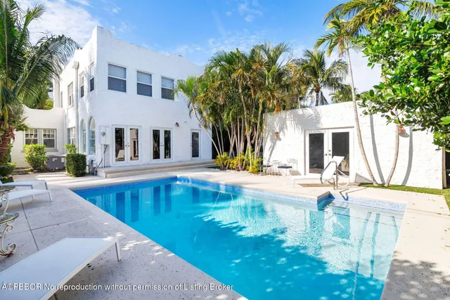 a view of a house with swimming pool