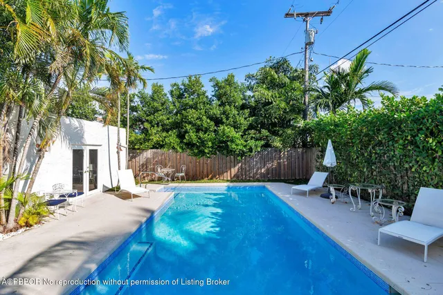 a view of a backyard with plants