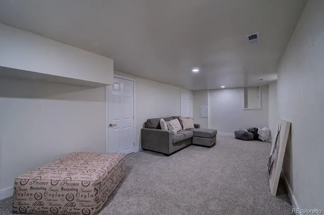 a view of a workspace with furniture