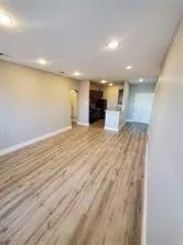 a view of a kitchen with a sink
