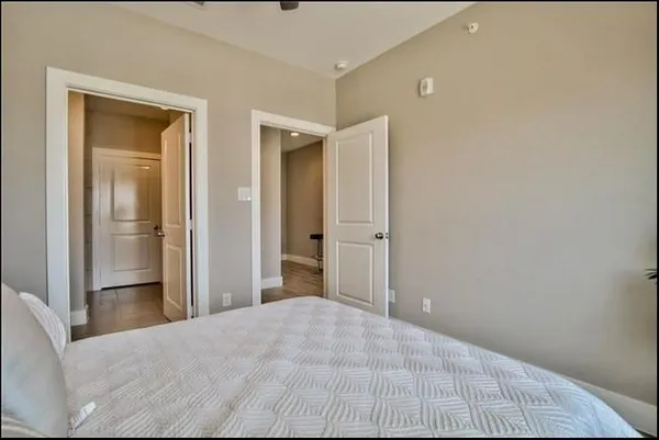 a view of a hallway with a wardrobe space