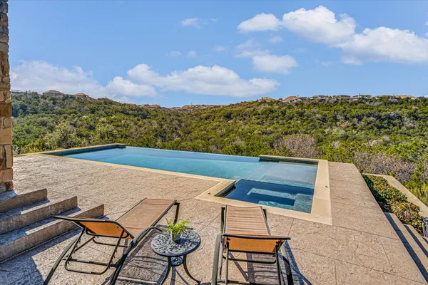 a view of a terrace with furniture