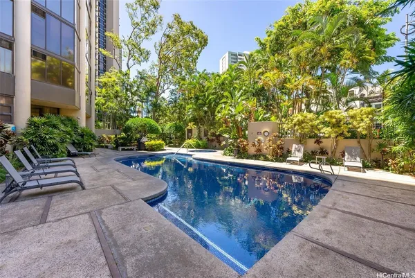 a view of wooden floor with a sitting area