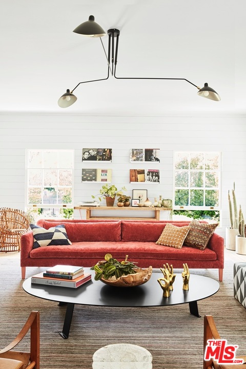 555 South Rimpau Boulevard Los Angeles, CA 90020 - Photo 2 of 17 a living room with furniture and a large window
