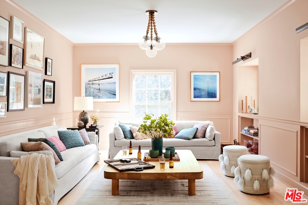 555 South Rimpau Boulevard Los Angeles, CA 90020 - Photo 8 of 17 a living room with furniture and a chandelier