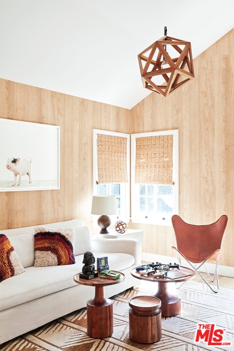 555 South Rimpau Boulevard Los Angeles, CA 90020 - Photo 9 of 17 a living room with furniture and a large window