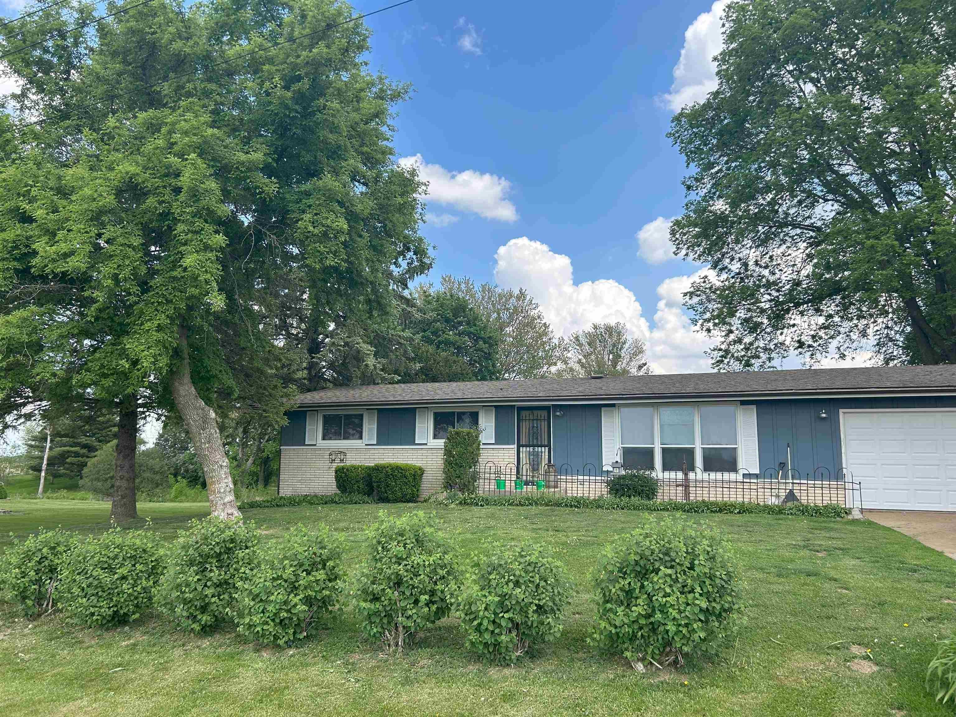 1377 South Bolton Road Freeport, IL 61032 - Photo 1 of 1 a front view of a house with a yard