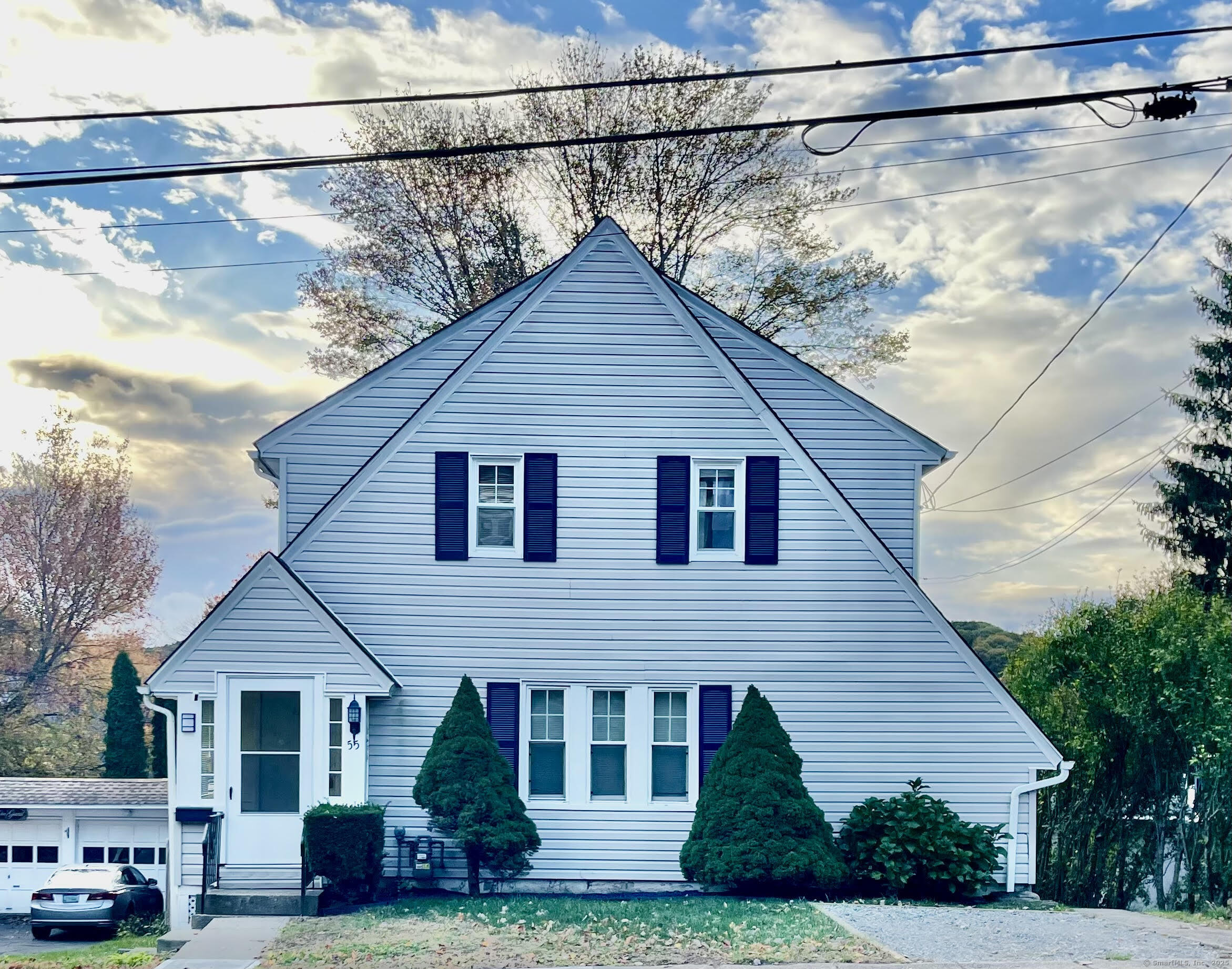 a view of a house with a yard