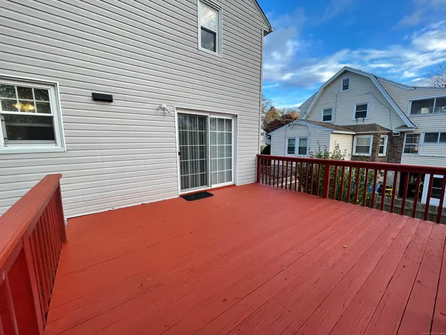a view of a bench in front of a yard