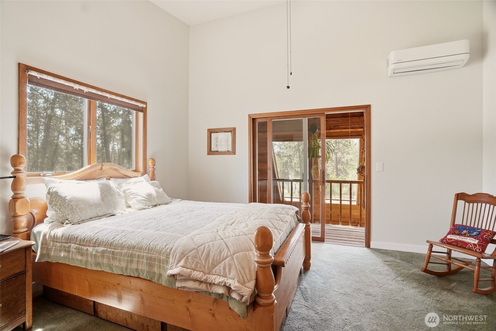 12119 South Spotted Road Cheney, WA 99004 - Photo 18 of 40 a bedroom with a bed and a window