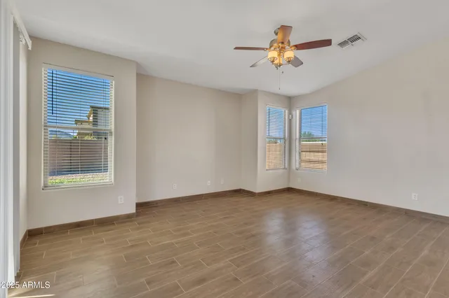 a view of kitchen with furniture and wooden floor