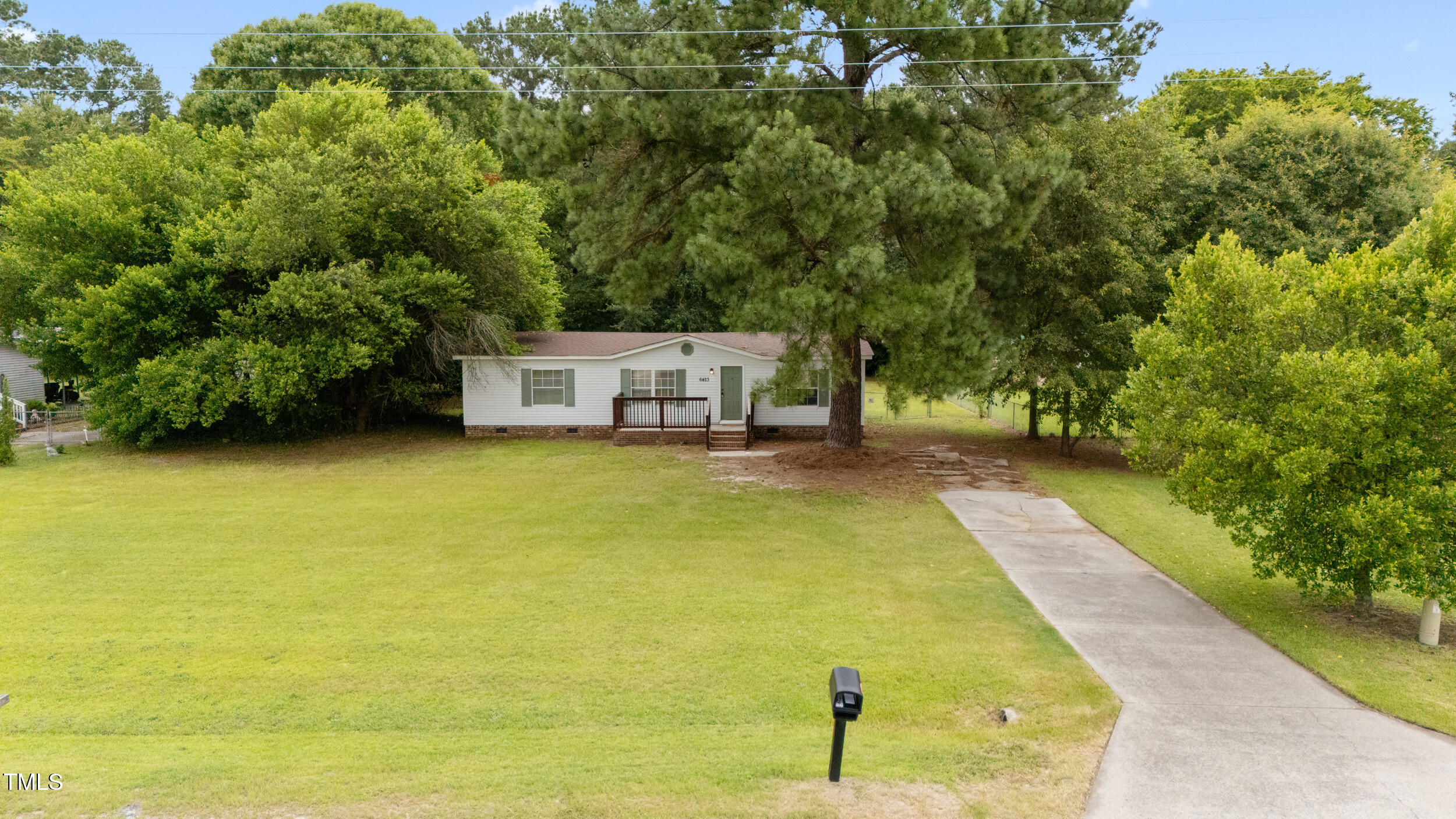 6423 Sandy Creek Road Stedman, NC 28391 - Photo 31 of 40 a view of a swimming pool with a yard