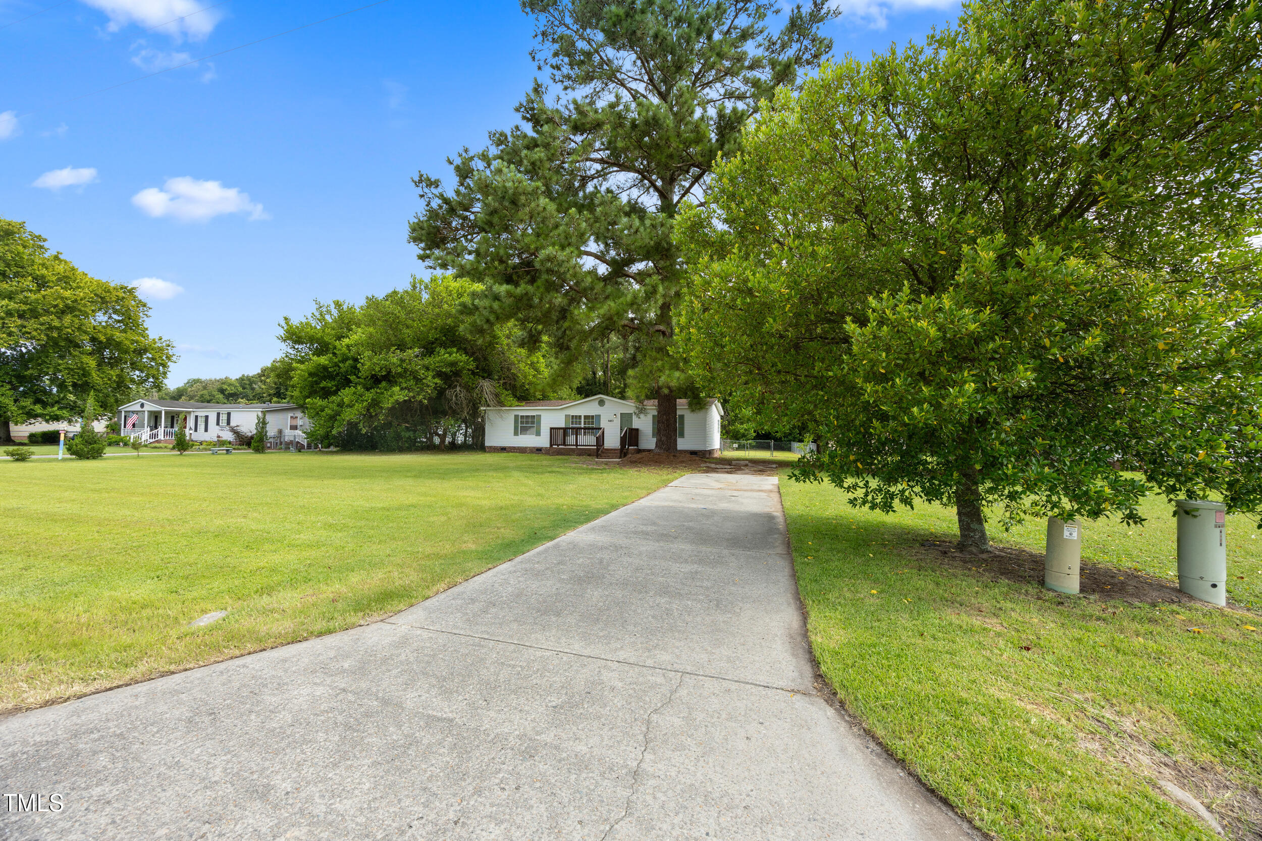 6423 Sandy Creek Road Stedman, NC 28391 - Photo 4 of 40 a view of a park with large trees