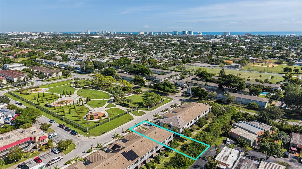 180 Southeast 5th Court Deerfield Beach, FL 33441 - Photo 22 of 25 an aerial view of residential building and city view