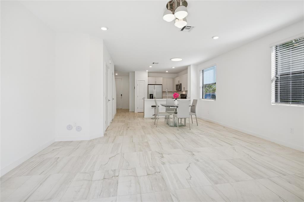 180 Southeast 5th Court Deerfield Beach, FL 33441 - Photo 7 of 25 a view of an empty room with a window