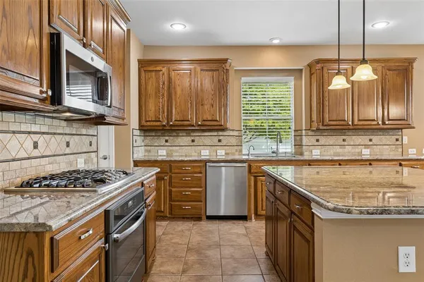 $629,850 | 8120 Bridge Street, North Richland Hills, TX 76180