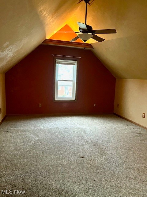 1260 Argonne Road Cleveland, OH 44121 - Photo 35 of 50 Additional living space featuring vaulted ceiling, carpet floors, and ceiling fan