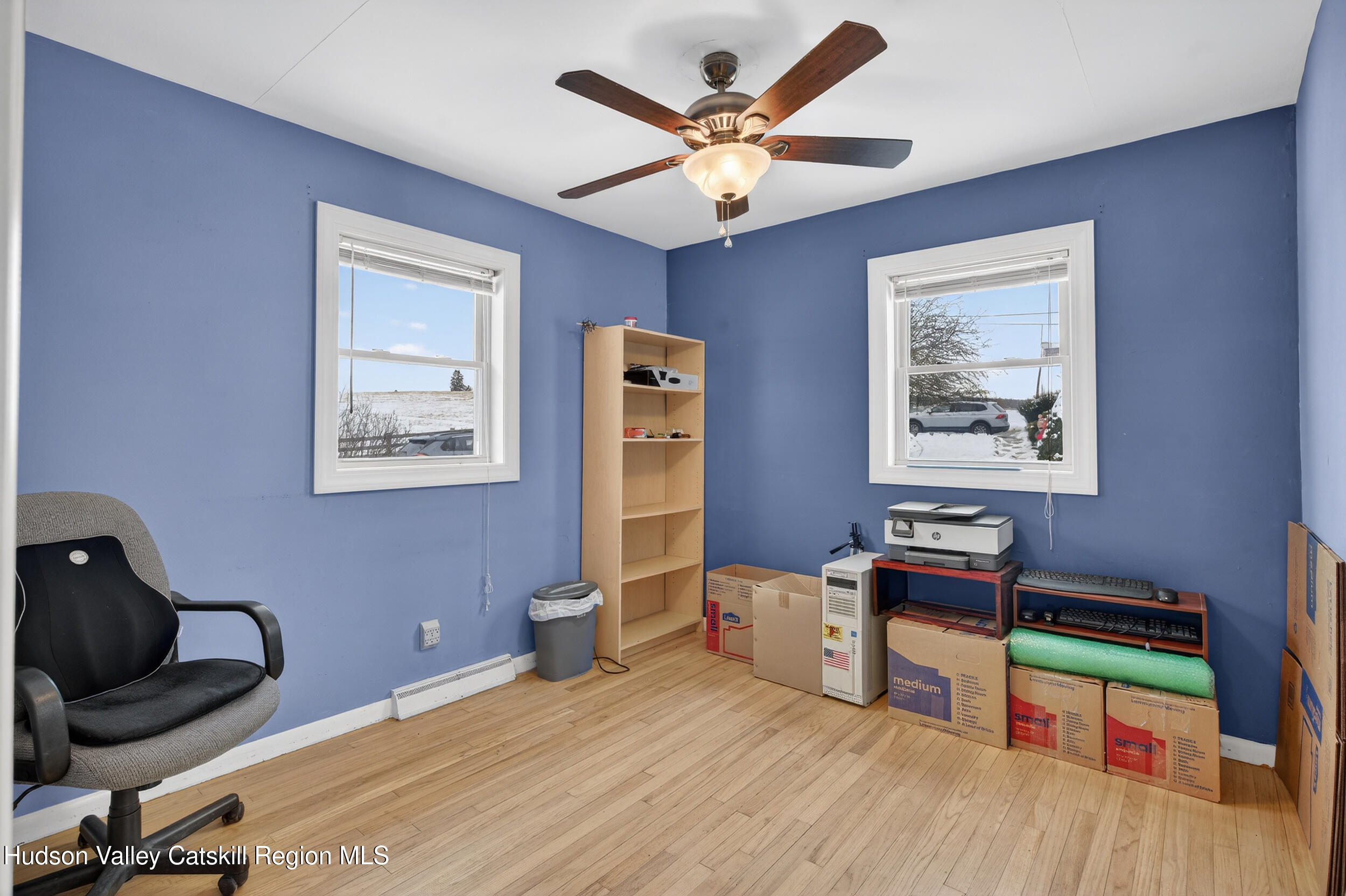 67 Picnic Woods Road Clintondale, NY 12515 - Photo 16 of 23 a bedroom with a bed and a chandelier