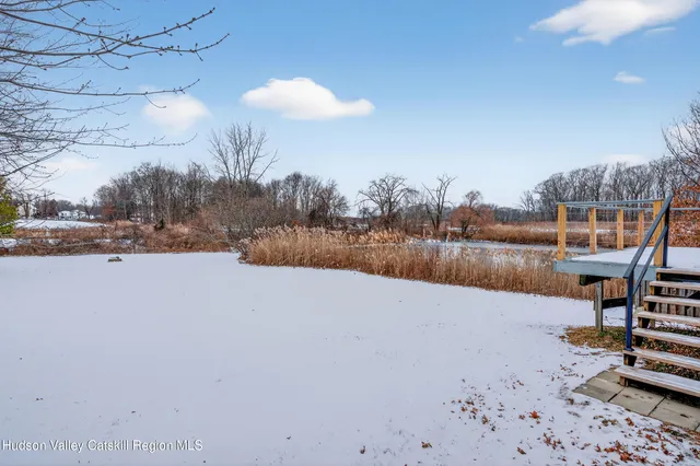 a view of staircase with a lake view