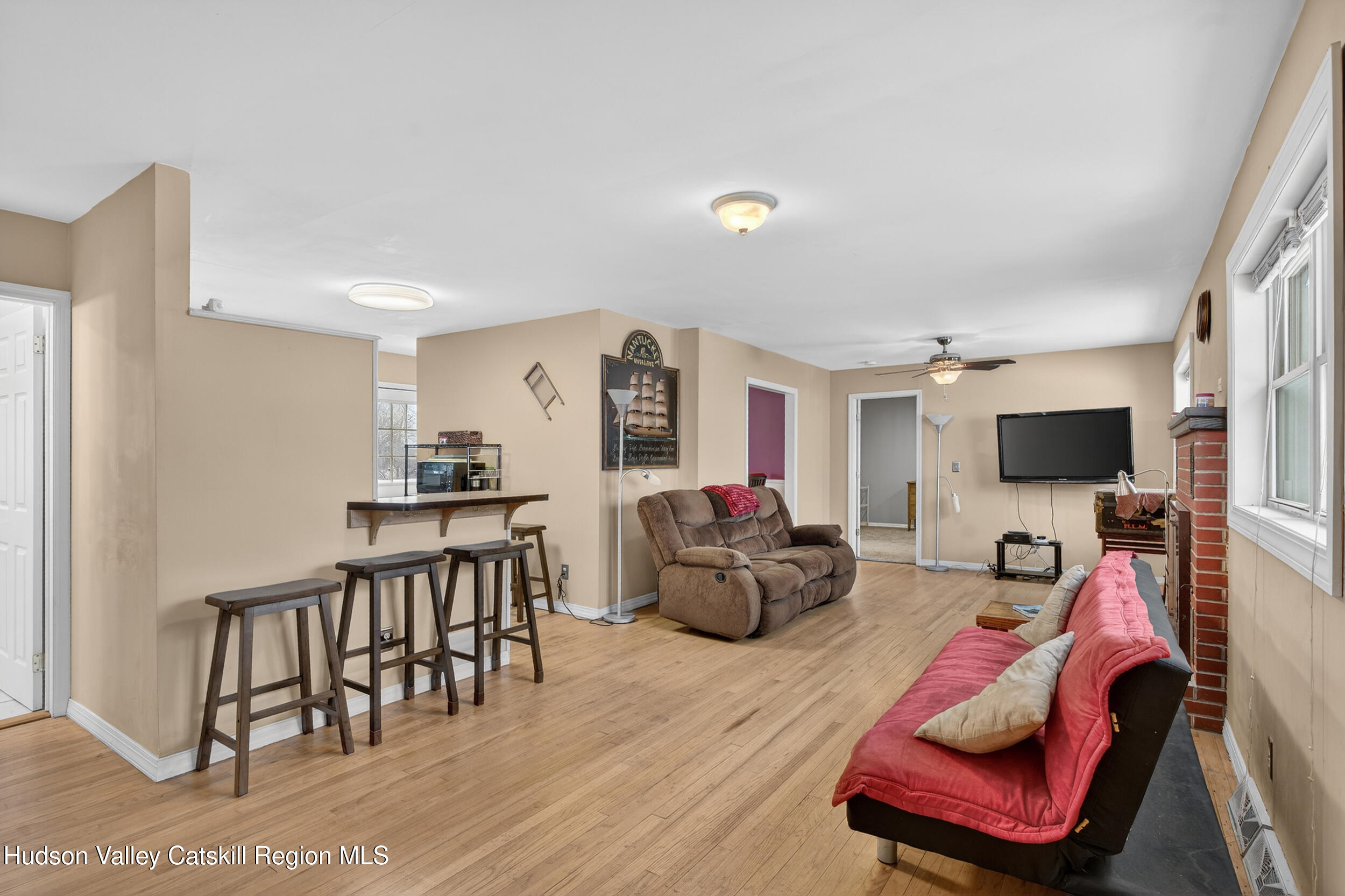 67 Picnic Woods Road Clintondale, NY 12515 - Photo 5 of 23 a living room with furniture and a flat screen tv