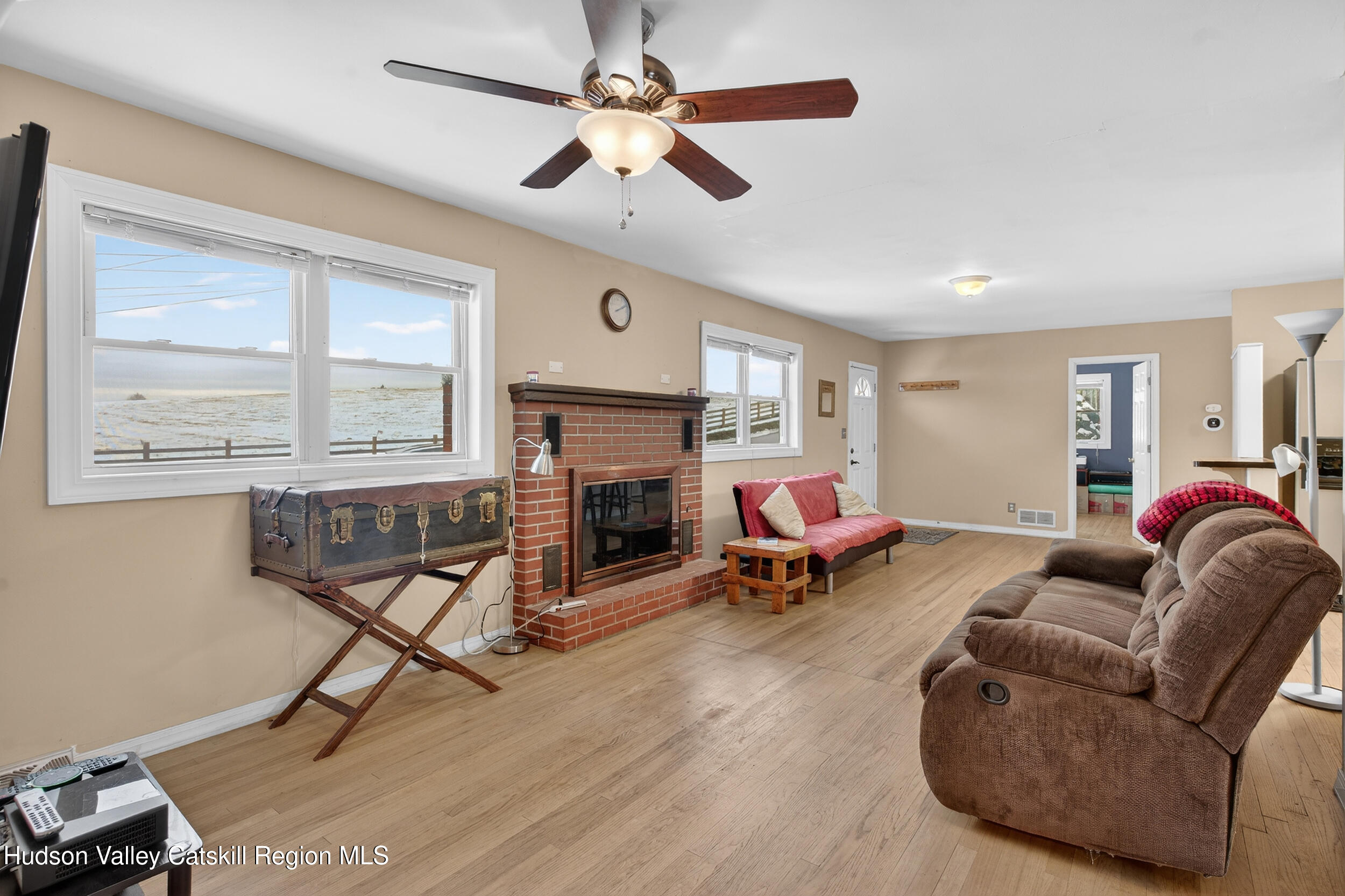 67 Picnic Woods Road Clintondale, NY 12515 - Photo 7 of 23 a living room with furniture and a fireplace