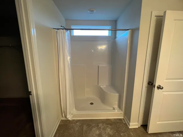 a view of a room with racks on the wall