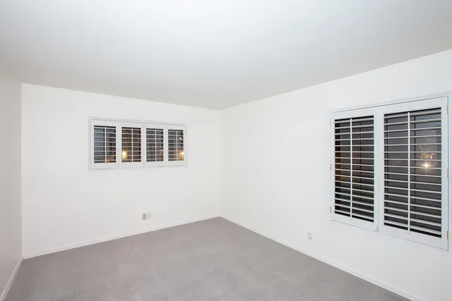 a view of a windows and garage