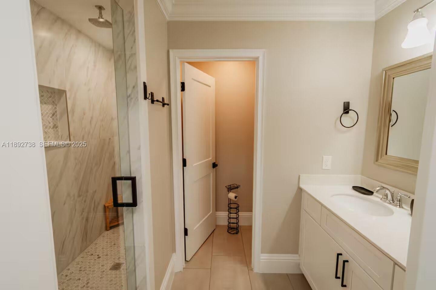 9675 Southwest Anchor, Unit 9674 Arcadia, FL 34269 - Photo 30 of 55 a bathroom with a sink and a mirror