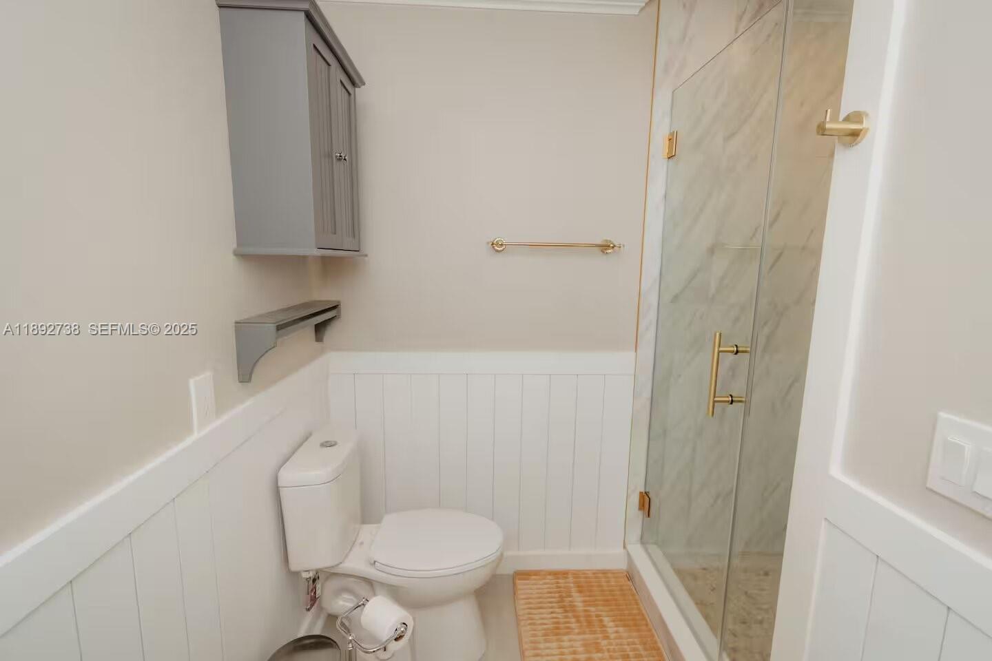 9675 Southwest Anchor, Unit 9674 Arcadia, FL 34269 - Photo 35 of 55 a bathroom with a toilet and a shower