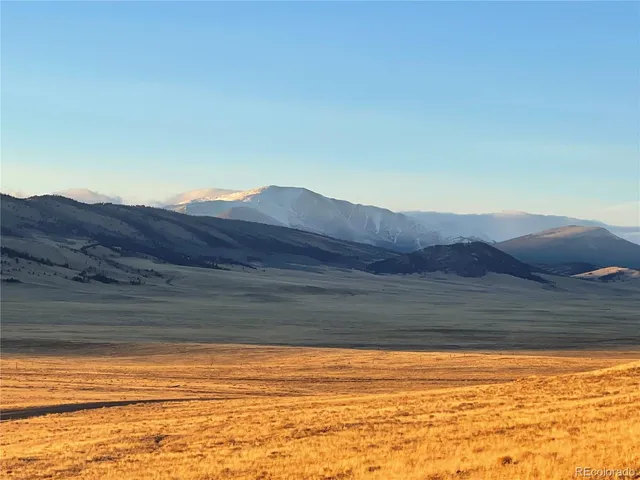a view of ocean and mountain