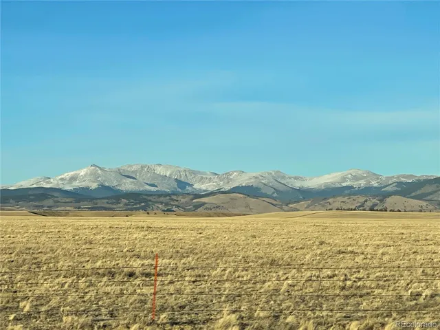 a view of a lake with mountains in the background