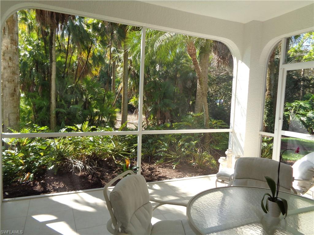 515 Laguna Royale Boulevard, Unit 102 Naples, FL 34119 - Photo 27 of 28 View of sunroom / solarium