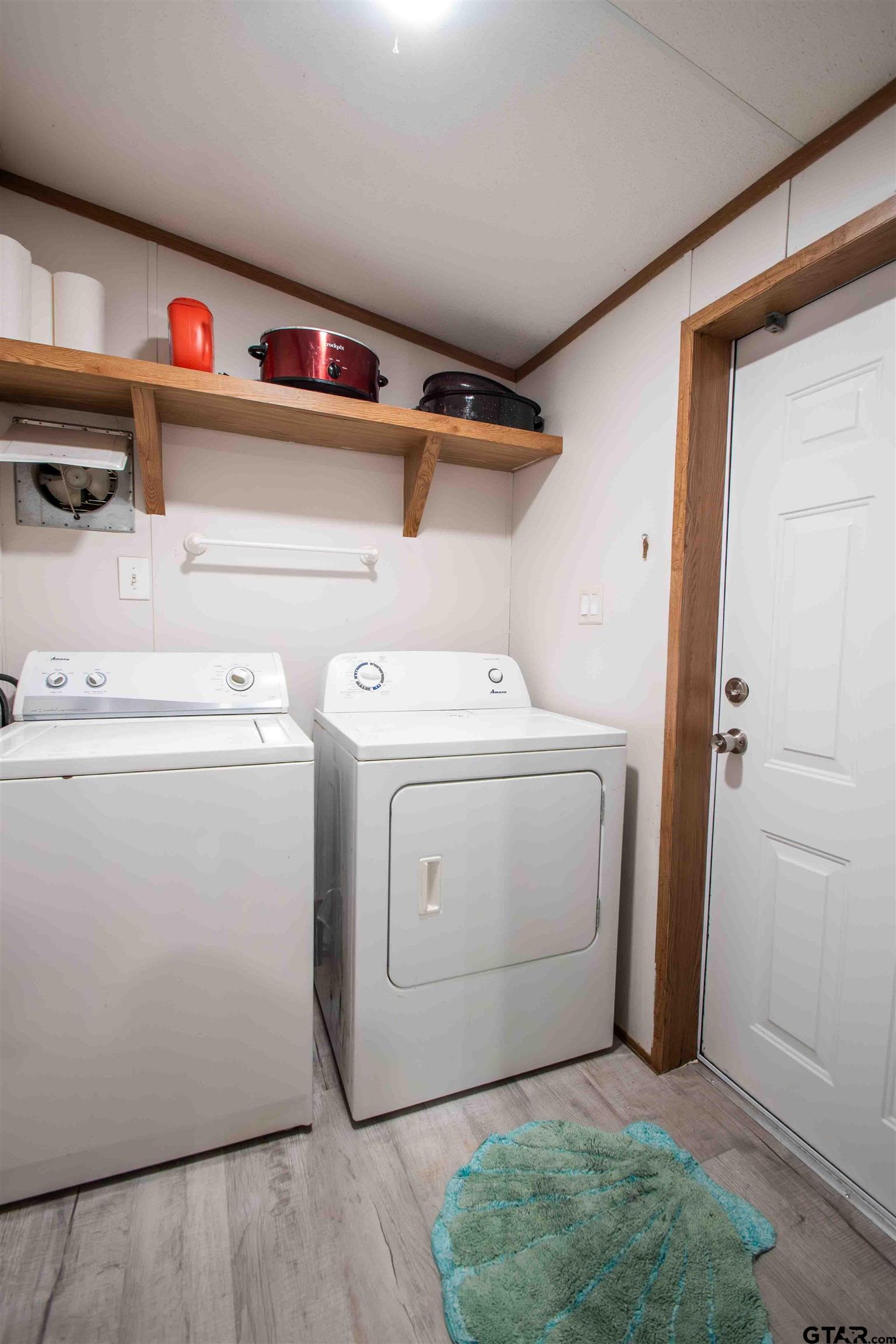 682 Dogwood Trail Murchison, TX 75778 - Photo 21 of 48 a utility room with dryer and washer