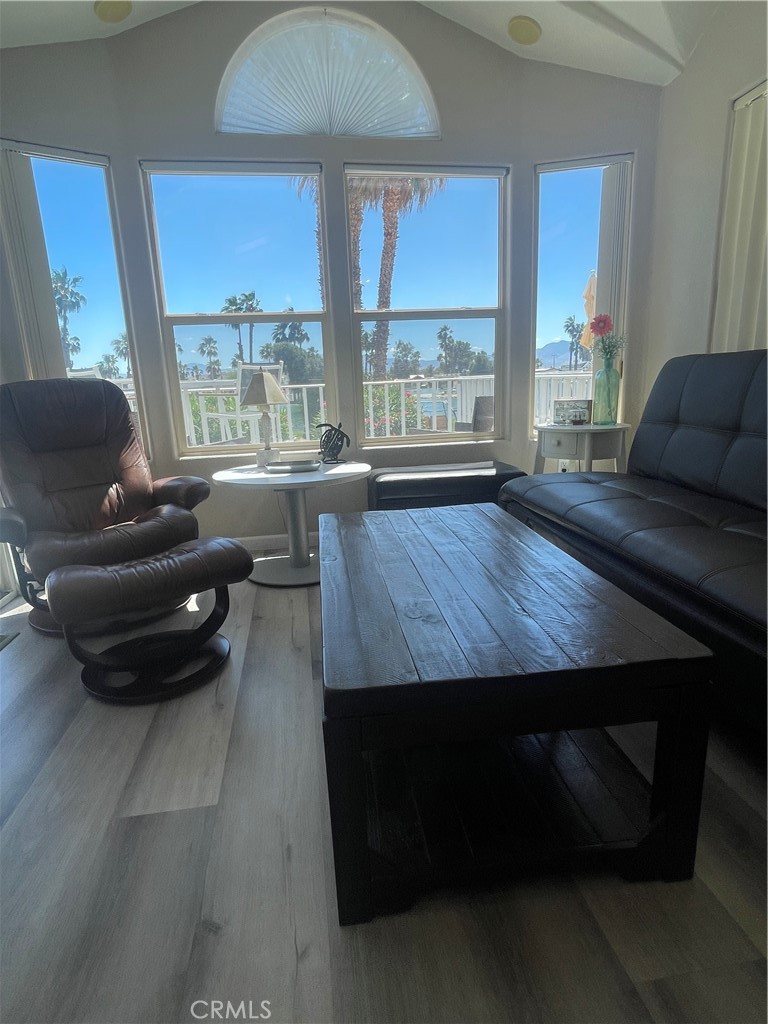 74711 Dillon Road, Unit 69 Desert Hot Springs, CA 92241 - Photo 2 of 18 a living room with furniture and a large window