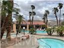 74711 Dillon Road, Unit 69 Desert Hot Springs, CA 92241 - Photo 10 of 18 a view of a yard in front of a building