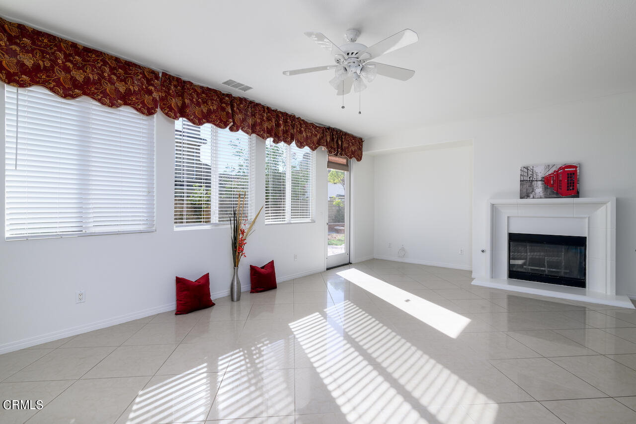 3716 E Park Camarillo, CA 93012 - Photo 12 of 29 a spacious bedroom with a bed and a fireplace