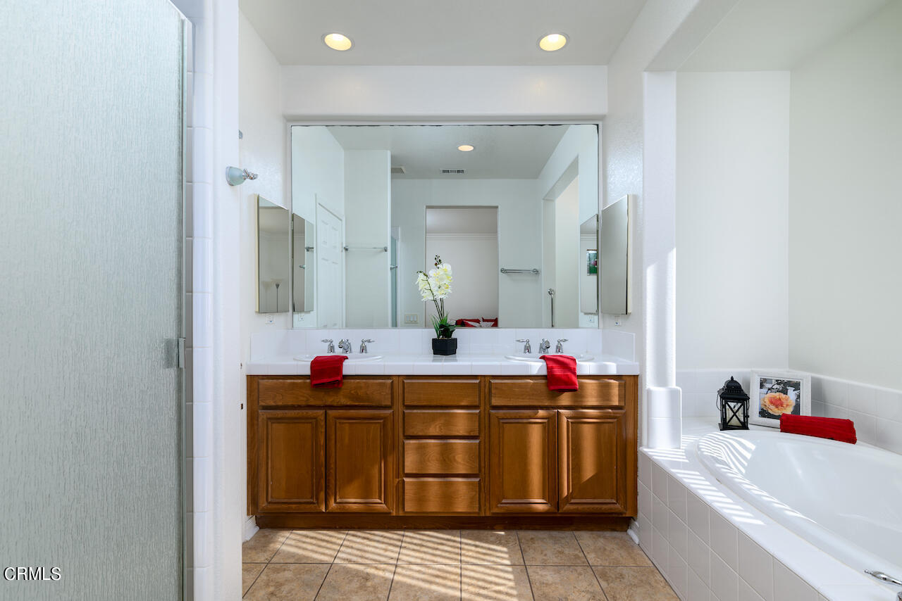 3716 E Park Camarillo, CA 93012 - Photo 17 of 29 a bathroom with a sink vanity tub and mirror