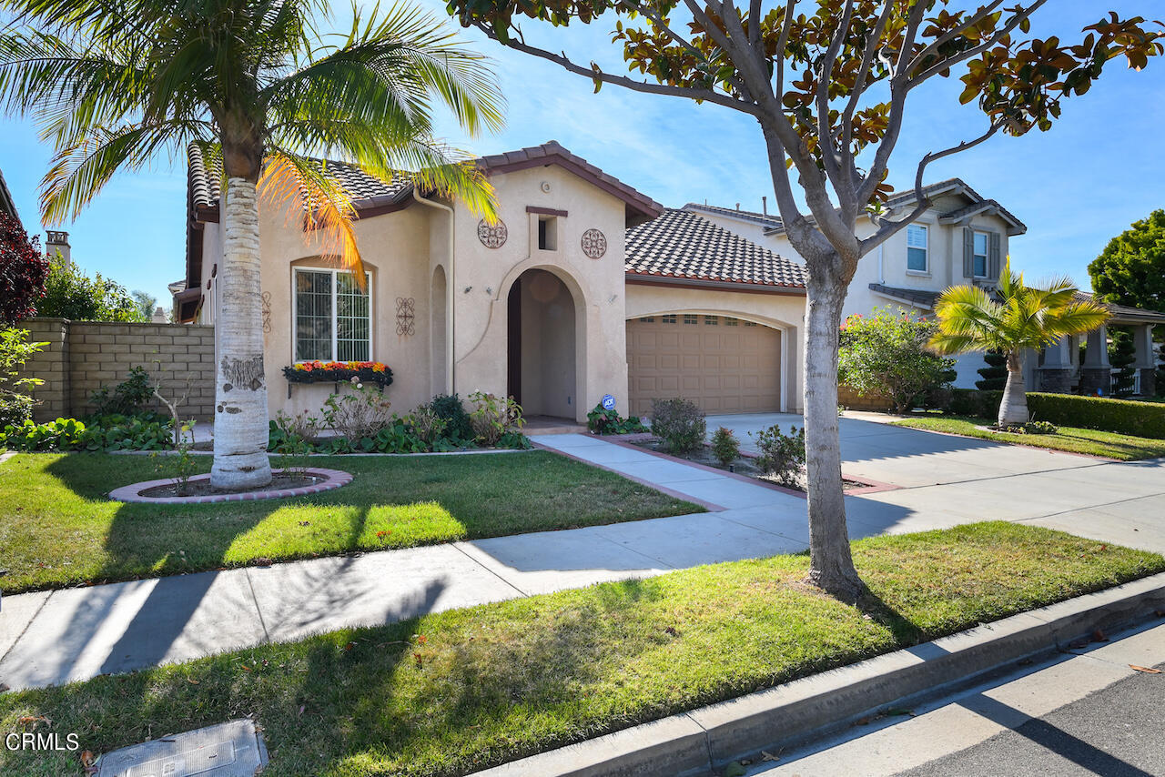 3716 E Park Camarillo, CA 93012 - Photo 2 of 29 a front view of a house with swimming pool and porch with furniture