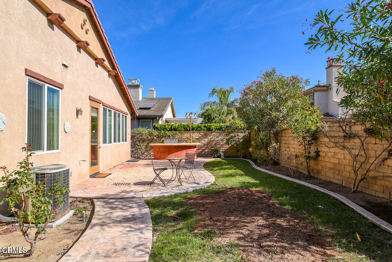 3716 E Park Camarillo, CA 93012 - Photo 29 of 29 a view of a patio with table and chairs and potted plants