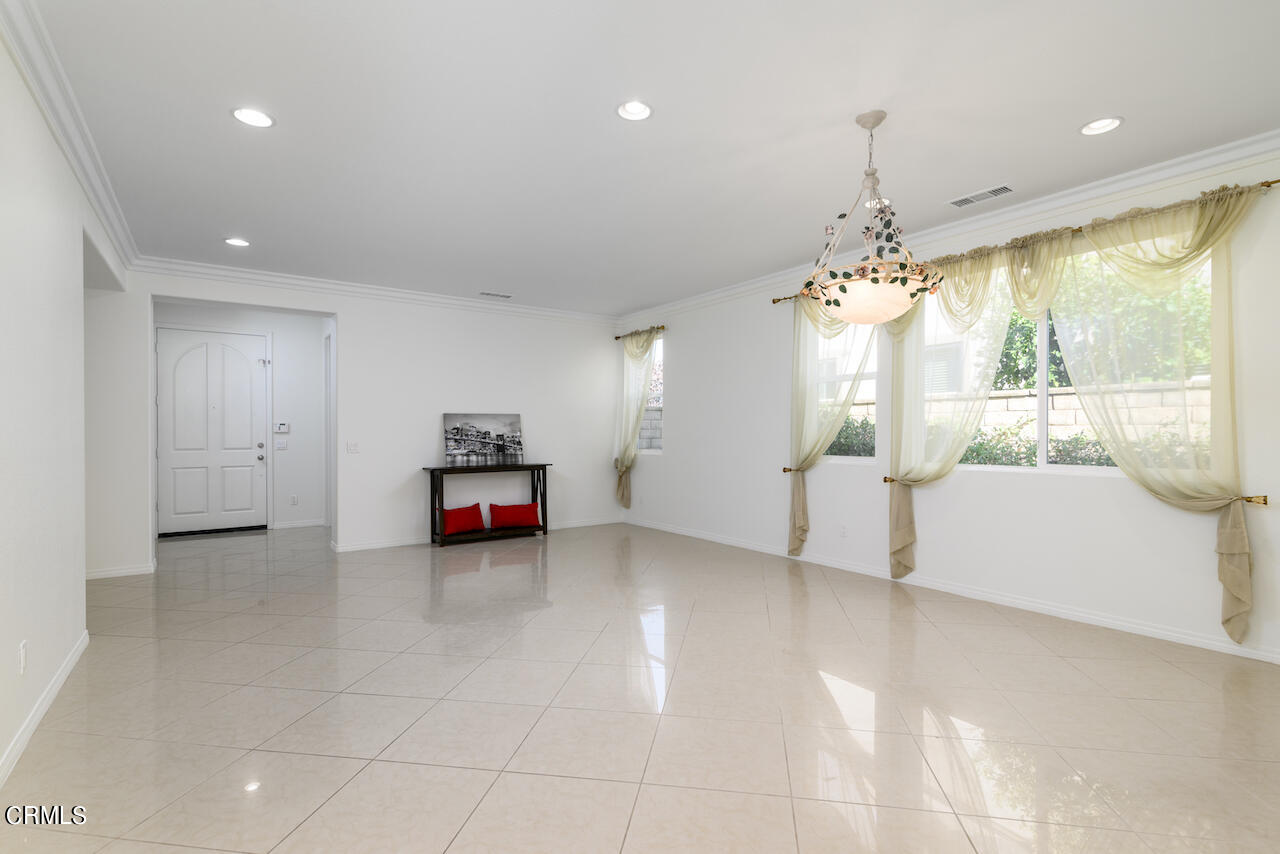 3716 E Park Camarillo, CA 93012 - Photo 6 of 29 a living room with furniture and a chandelier