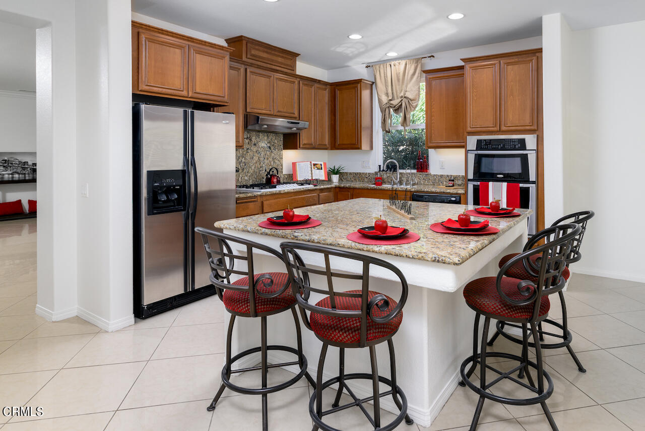 3716 E Park Camarillo, CA 93012 - Photo 9 of 29 a table and chairs in a kitchen