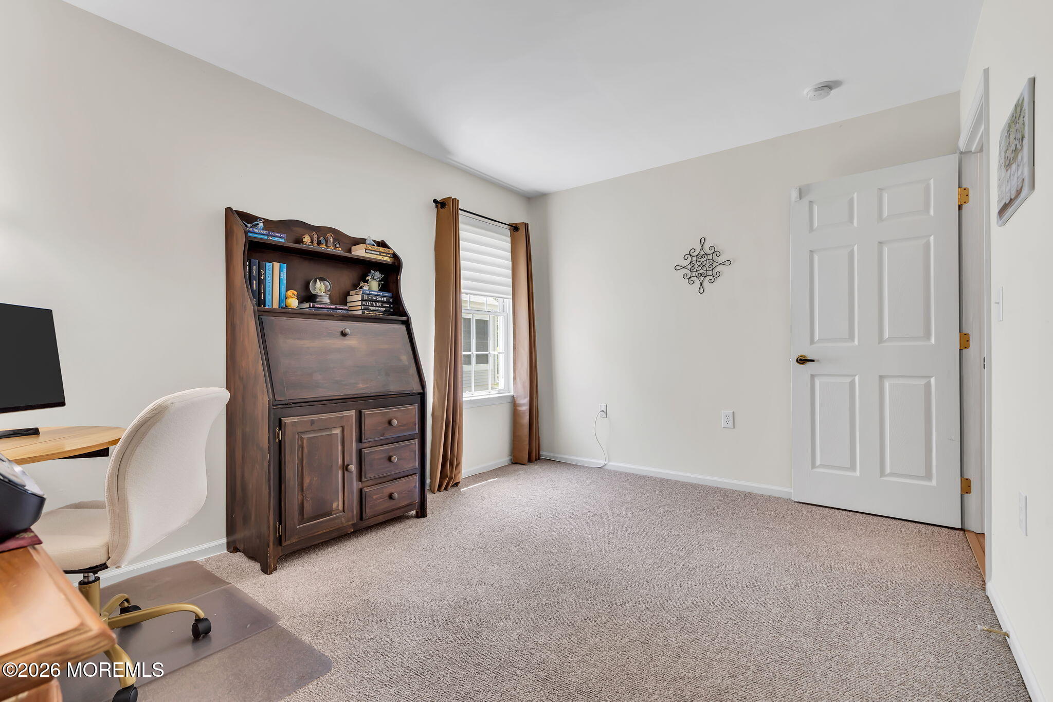 10 Congressional Road Jackson, NJ 08527 - Photo 51 of 72 a view of a workspace with furniture and a window