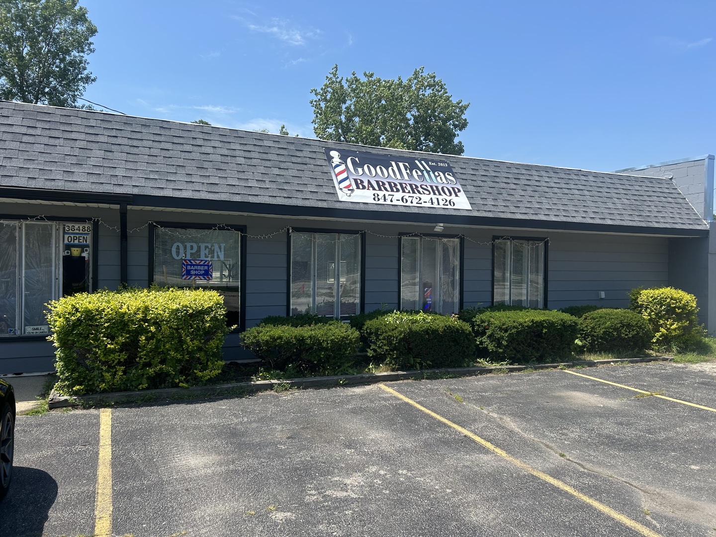 38488 North Sheridan Road Beach Park, IL 60087 - Photo 2 of 14 a front view of a house with garden