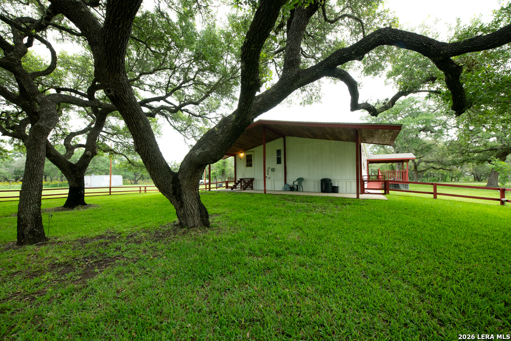 104 Longhorn Road Stockdale, TX 78160 - Photo 2 of 47 a view of a couches in a backyard