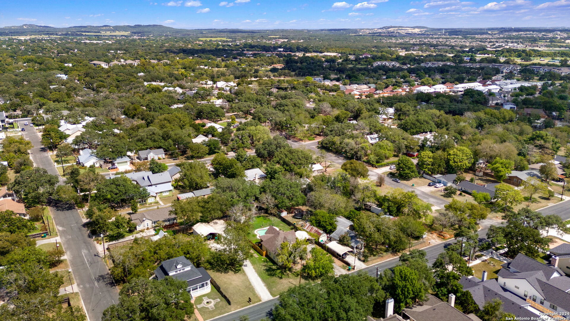 410 East Bandera Road Boerne, TX 78006 - Photo 13 of 17 an aerial view of town with residential houses with outdoor space and trees