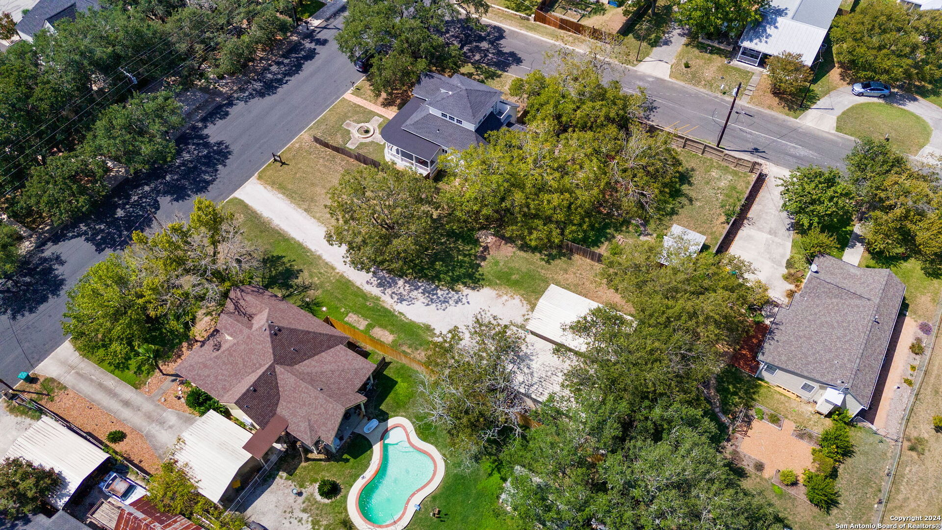 410 East Bandera Road Boerne, TX 78006 - Photo 16 of 17 an aerial view of a house with a yard