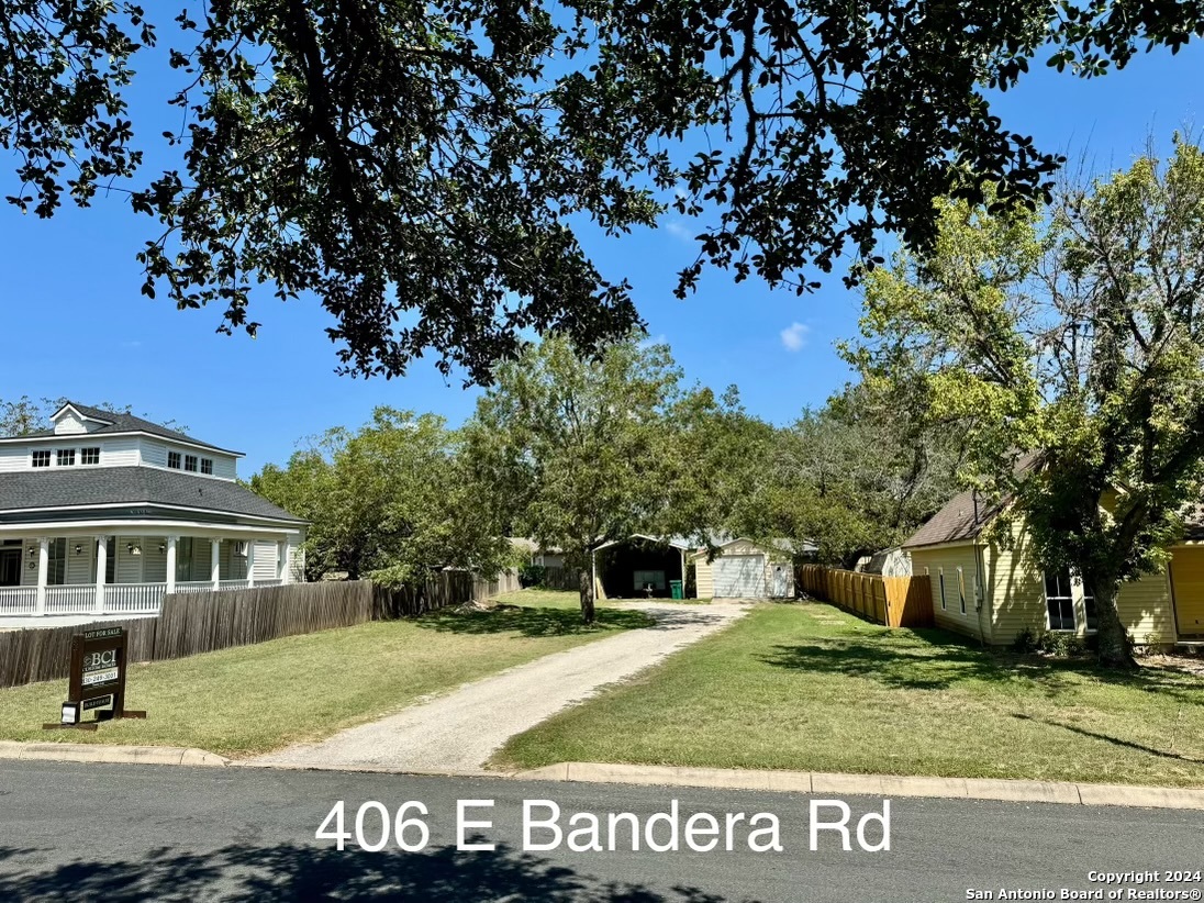 410 East Bandera Road Boerne, TX 78006 - Photo 2 of 17 a view of a house with a yard