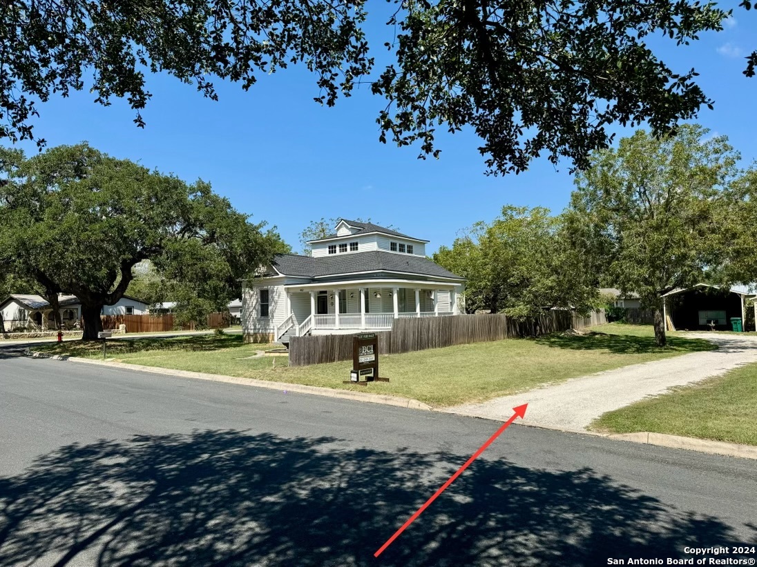 410 East Bandera Road Boerne, TX 78006 - Photo 5 of 17 a view of a house with a yard