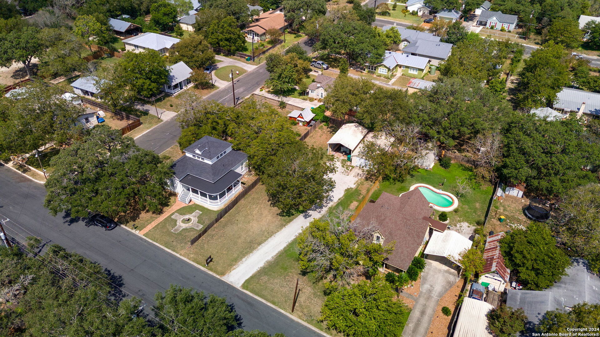 410 East Bandera Road Boerne, TX 78006 - Photo 9 of 17 an aerial view of residential houses with outdoor space